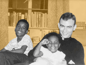 Jonathan Daniels with the Scott family.